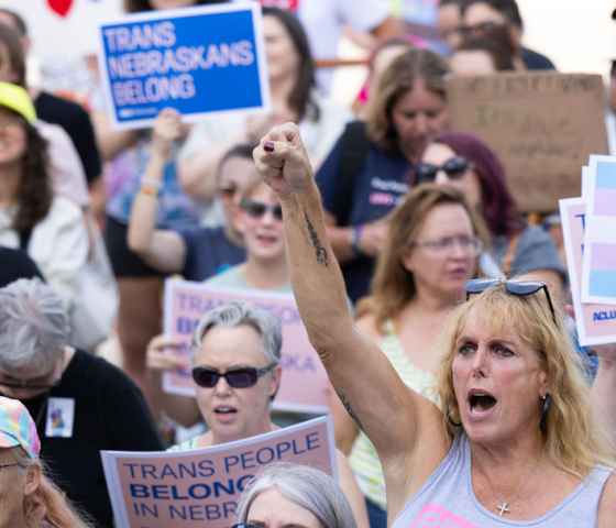 Nebraskans gather outside the Capitol to tell state senators to protect trans youth.